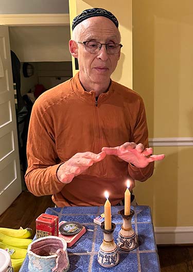 Michael lighting candles